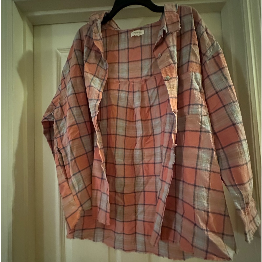 Button up plaid new never worn from chic soul. It’s not a flannel material